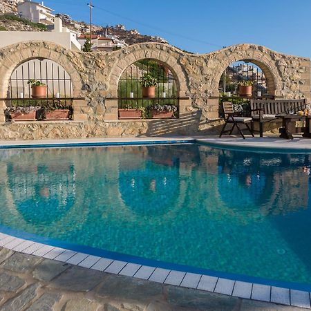 Four Seasons Stonework Castle Villa Lagonisi Bagian luar foto