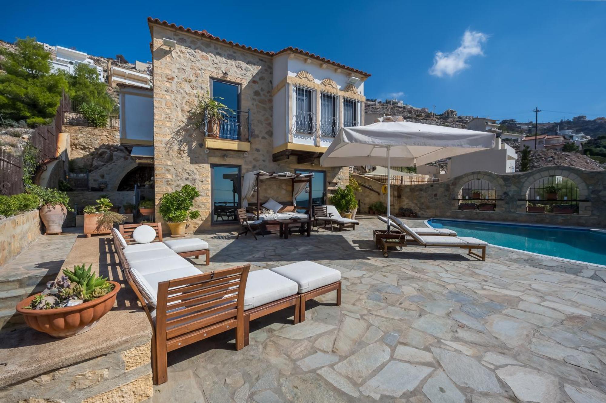 Four Seasons Stonework Castle Villa Lagonisi Bagian luar foto