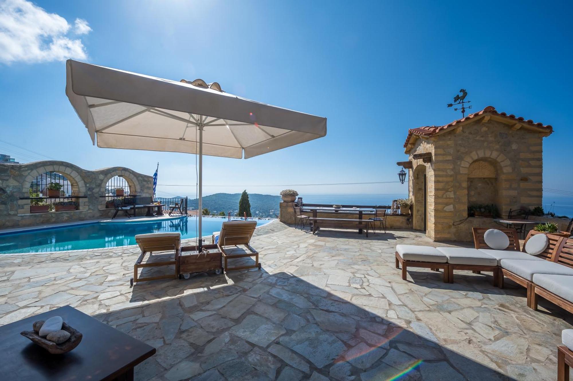 Four Seasons Stonework Castle Villa Lagonisi Bagian luar foto